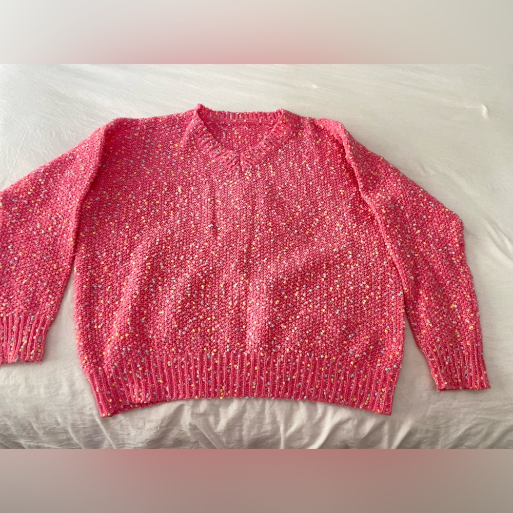 Bright pink knitted sweater
